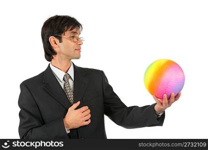 Businessman with multicolor ball