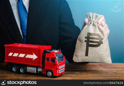 Businessman with philippine peso money bag and truck. Good salaries for drivers. Rising prices, global containers shortage crisis. High income of the transport business and the transport of goods.