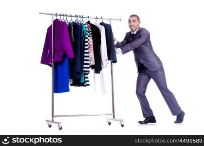 Businessman with rack of clothing