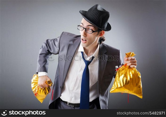 Businessman with sacks of presents