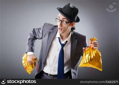 Businessman with sacks of presents