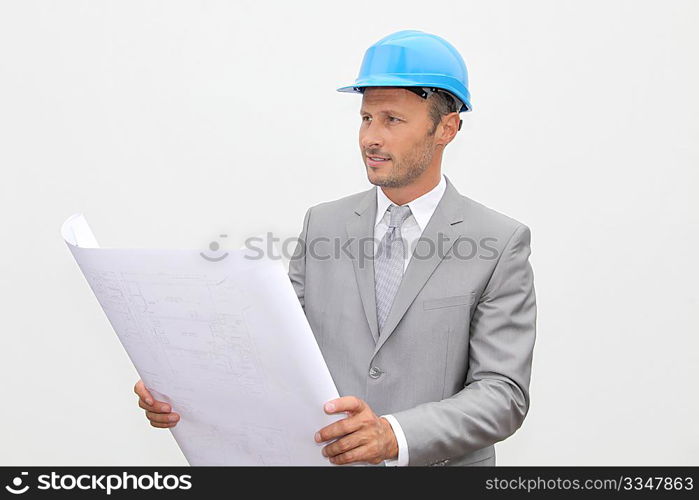 Businessman with security helmet on white background