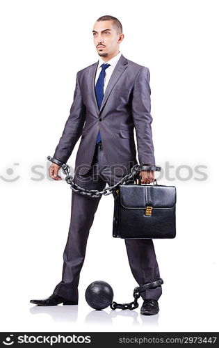 Businessman with shackles on white