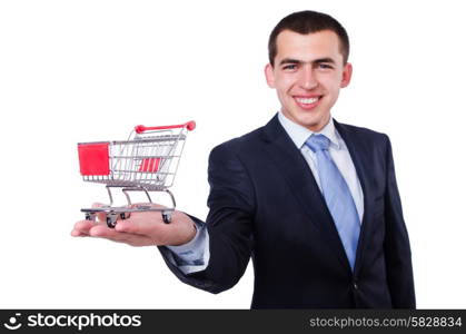 Businessman with shopping cart on white