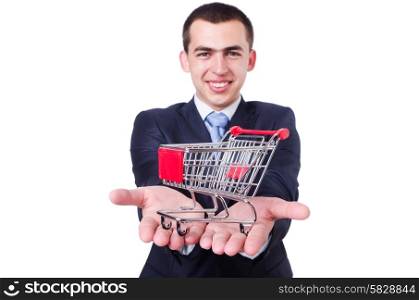 Businessman with shopping cart on white