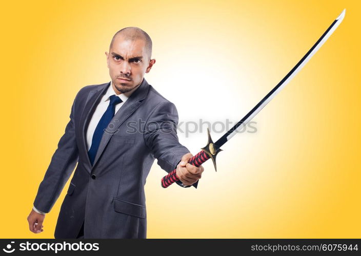 Businessman with sword isolated on white