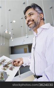 Businessman with Telephone Earbud Headset