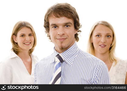 Businessman with two businesswomen smiling