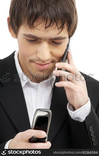 businessman with two cellular phones over white