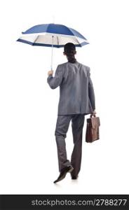 Businessman with umbrella on white