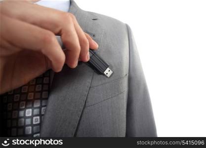 Businessman with USB key in hand