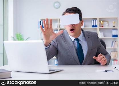 Businessman with virtual reality glasses in modern technology co. Businessman with virtual reality glasses in modern technology concept. Businessman with virtual reality glasses in modern technology co