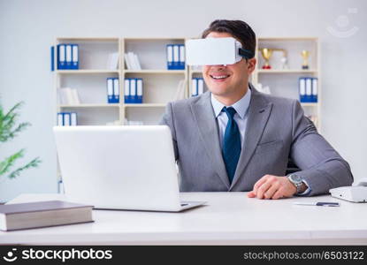 Businessman with virtual reality glasses in modern technology co. Businessman with virtual reality glasses in modern technology concept. Businessman with virtual reality glasses in modern technology co