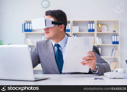 Businessman with virtual reality glasses in modern technology concept. Businessman with virtual reality glasses in modern technology co