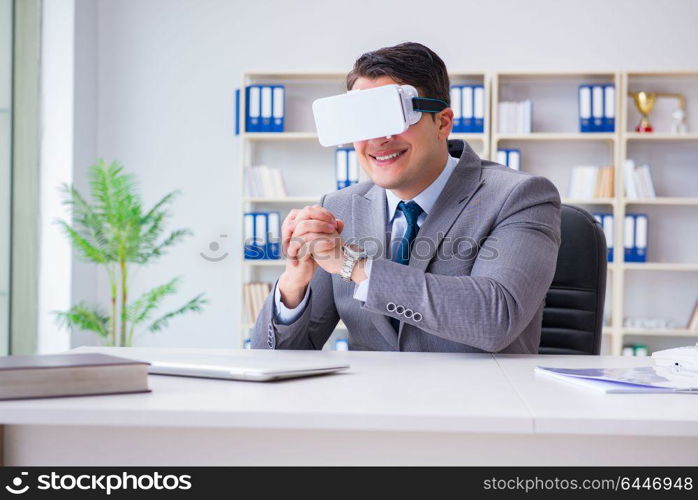 Businessman with virtual reality glasses in modern technology concept. Businessman with virtual reality glasses in modern technology co