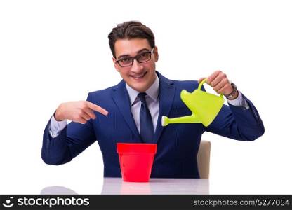 Businessman with watering can isolated on white