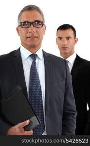 Businessman with young apprentice