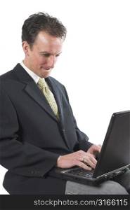 Businessman working concentrated on his laptop