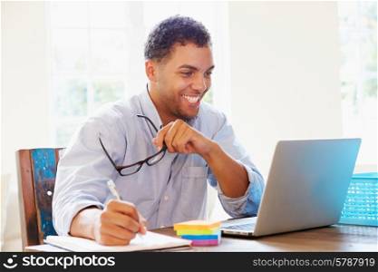 Businessman Working In Office At Home