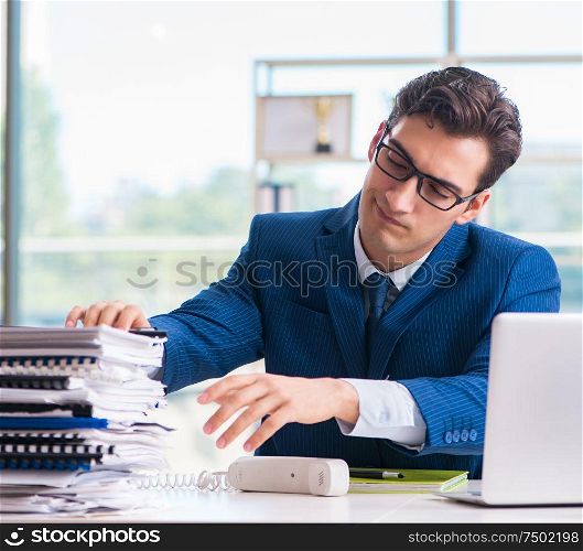 Businessman working in the office. The businessman working in the office