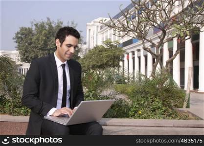 Businessman working on a laptop , INDIA , DELHI