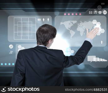 Businessman working on a virtual digital keyboard