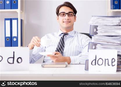 Businessman working on his to-do list