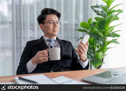 Businessman working on laptop for on office desk workspace. Smart executive researching financial business data or planning strategic business marketing with computer on table. Jubilant. Businessman working on laptop for on office desk workspace. Jubilant