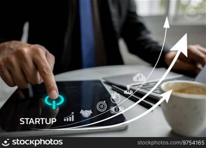 Businessman working on startup plan. Graph chart of business growth on laptop with icon business and network connection on digital interface. Investment and finance strategy for future success