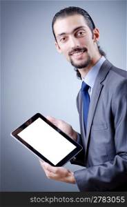Businessman working on tablet computer