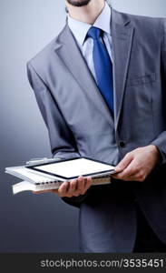 Businessman working on tablet computer