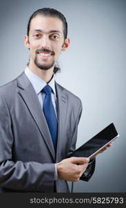 Businessman working on tablet computer