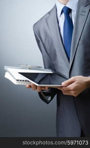 Businessman working on tablet computer