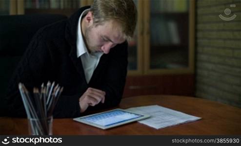 Businessman Working On Tablet Computer. RAW HD Video