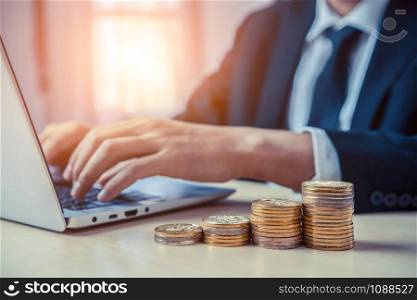 Businessman working with coin money currency. Concept of investment growth and money saving.