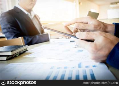 businessman working with digital tablet computer and smart phone and laptop.