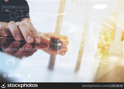businessman working with digital tablet computer with digital business strategy layer effect on wooden desk as concept