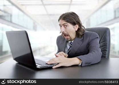 businessman working with is laptop at the office