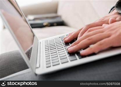 Businessman working with laptop in business concept