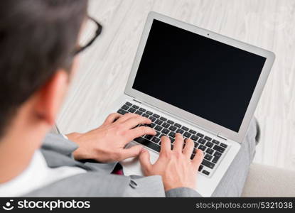 Businessman working with laptop in business concept