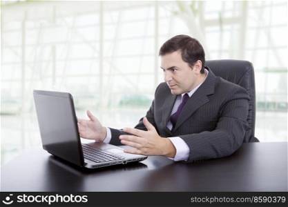 businessman working with laptop on a desk, at the office