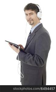 businessman working with tablet pc and headphones, isolated. businessman working