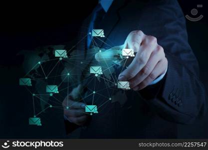 Businessman working with the new computer interface sending email as network concept