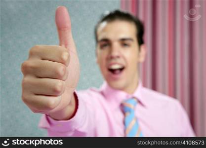 Businessman young with okay sign in his hand over wallpaper background