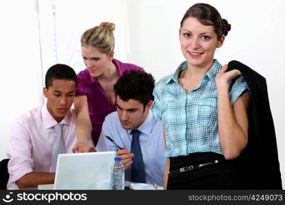 businessmen and businesswomen working at the office