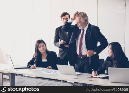 Businessmen and group using notebook for partners discussing documents and ideas in meeting and business serious for working