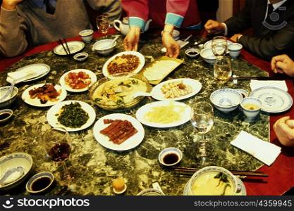 Businessmen at a banquet table, Nanjing, Jiangsu Province, China