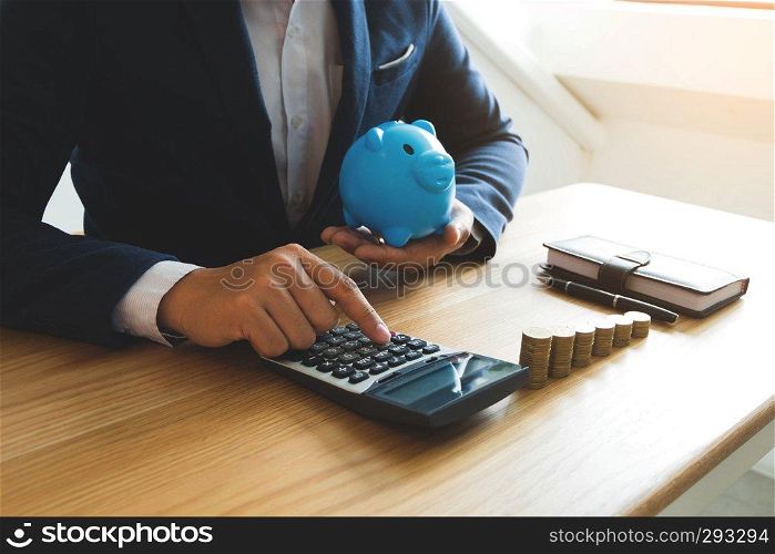Businessmen calculate the cost each day to keep the money .finance concept .