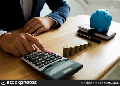 Businessmen calculate the cost each day to keep the money .finance concept .