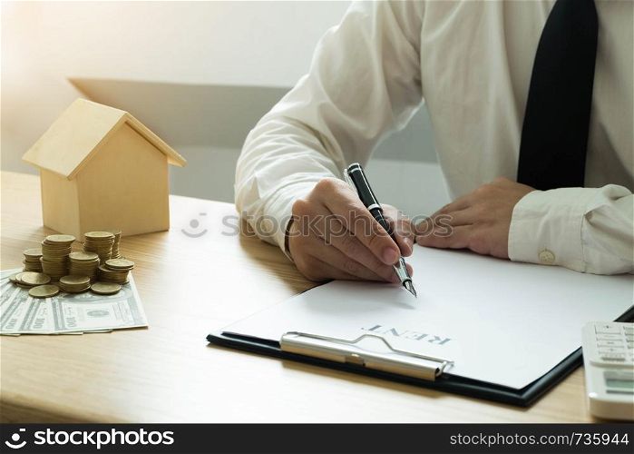Businessmen contract on trading - rent a house. Businessmen insurance home. Business concept.